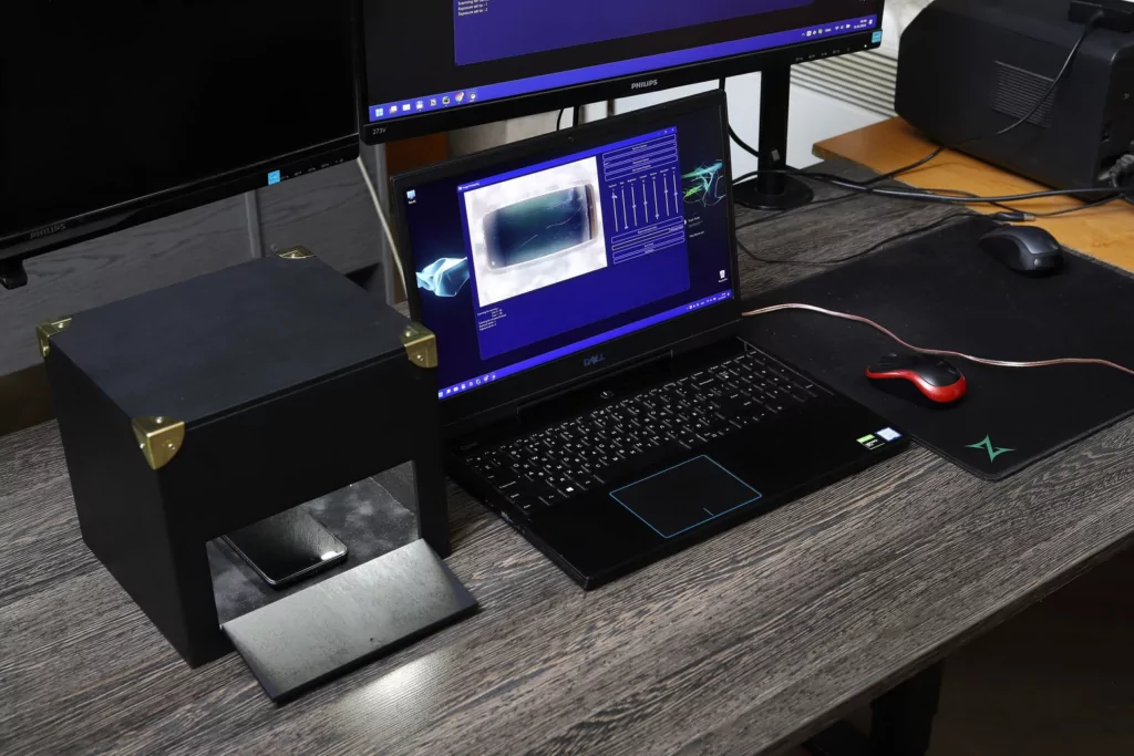 In this image, you can see the device connected to the laptop with a software for image grabbing and processing.